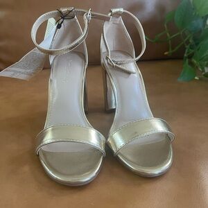 Gold block heel ankle strap heels